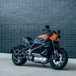 black and orange motorcycle