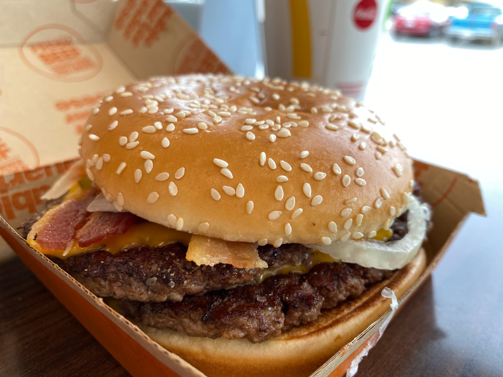 burger on brown wooden table